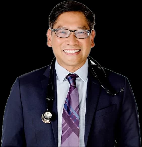 Dr. Emmanuel Tancinco, MD, in a navy suit with a stethoscope