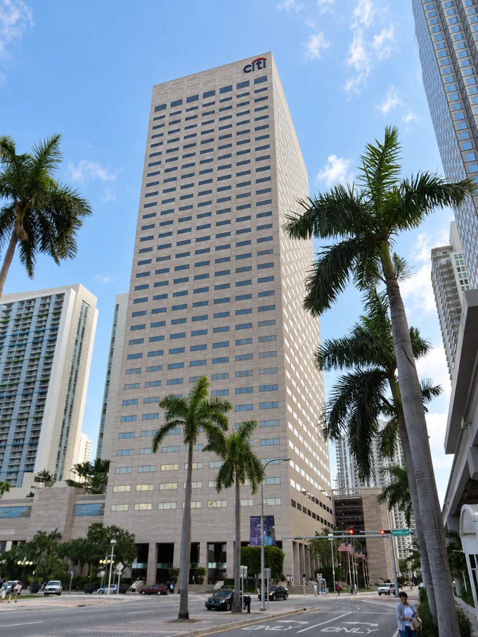 Miami Center building framed by palm trees
